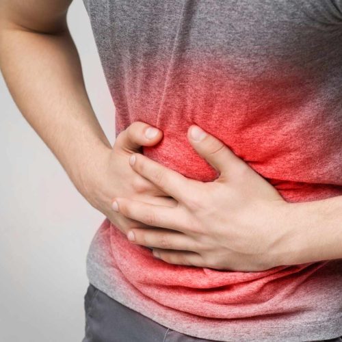 why is my stomach hard when i press on it